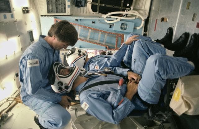 NASA image: Payload specialists Marc Garneau and Paul Scully-Power in SMS