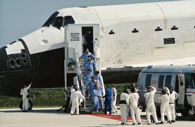 NASA image: STS 41-G crew leaves orbiter after landing at Kennedy Space Center