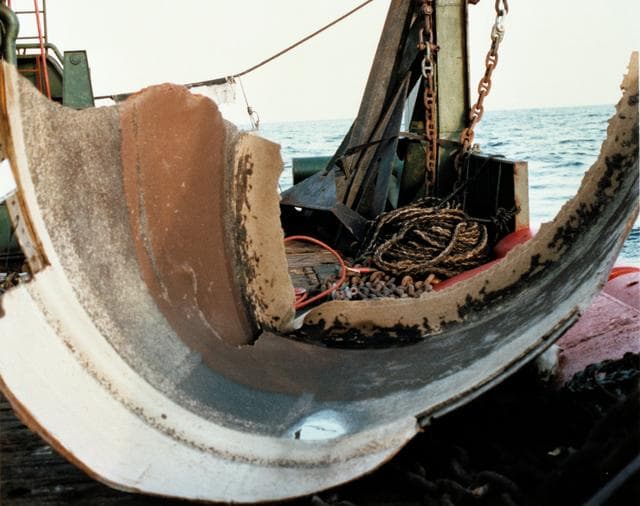 NASA image: View of left SRB first piece retrieval
