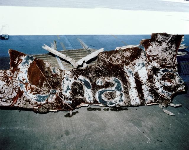 NASA image: Segment of Challenger's right wing unloaded at KSC Logistics Facility
