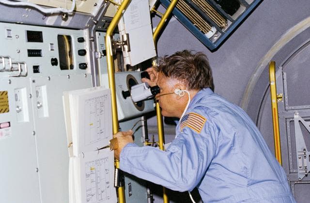 NASA image: Astronauts Don Lind observes growth of crystals in VCGS aboard orbiter