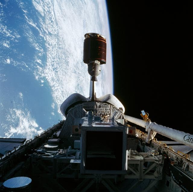 NASA image: Telstar 3-D communications satellite deploying from Discovery's payload bay
