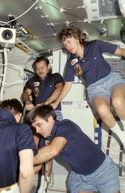 NASA image: Four STS 51-G crewmembers on Discovery's middeck
