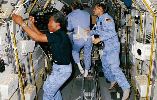 NASA image: STS 61-A crewmembers in Spacelab D-1 science module