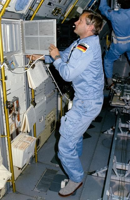 NASA image: STS 61-A crewmembers in Spacelab D-1 science module