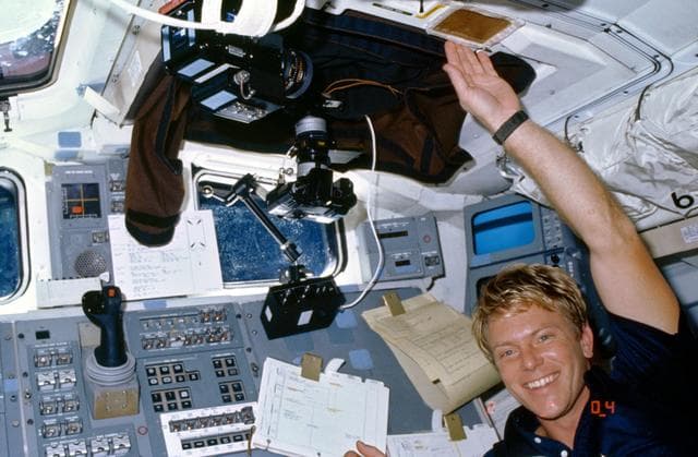NASA image: Astronaut George Nelson working on Comet Halley Active monitoring program