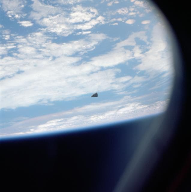 NASA image: Piece of thermal insulation tile floats near the Shuttle Columbia