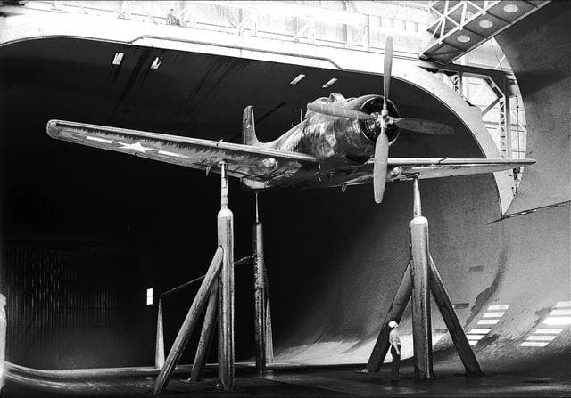 NASA image: BT2D-1 Airplane lowering into the 40x80 foot Wind Tunnel at Ames.