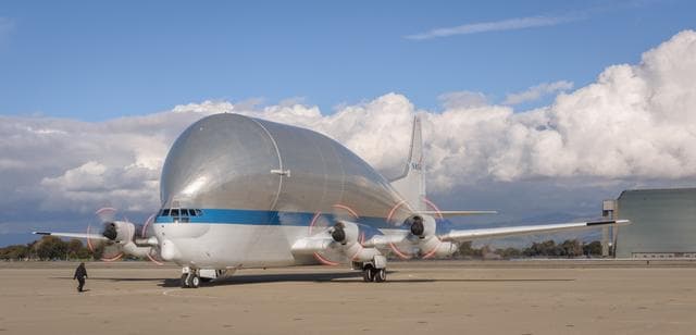 NASA image: NASAs B377SGT Super Guppy Turbine Cargo Airplane lands at Moffett Field at NASA Ames.