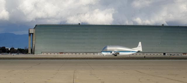 NASAs B377SGT Super Guppy Turbine Cargo Airplane lands at Moffett Field at NASA Ames.