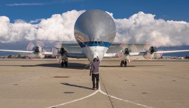 NASA image: NASAs B377SGT Super Guppy Turbine Cargo Airplane lands at Moffett Field at NASA Ames.