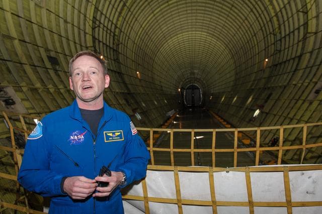 NASA image: Super Guppy Flight Engineer Michael Robinson inside the Cargo Hold.