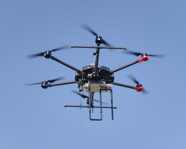 NASA image: The Earth Science Unmanned Aerial System (UAS) Demonstration in the Rover Scape at NASA's Ames Research Center.