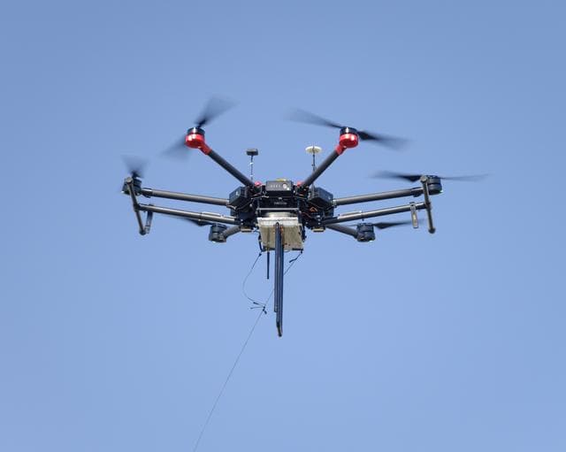 NASA image: The Earth Science Unmanned Aerial System (UAS) Demonstration in the Rover Scape at NASA's Ames Research Center.