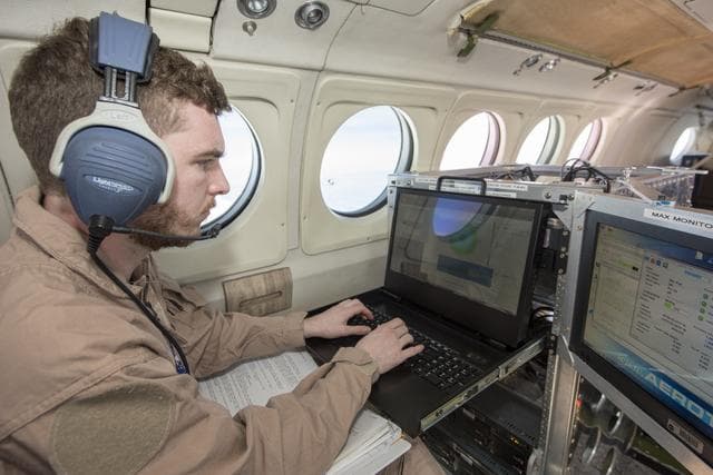 NASA image: Instrument Operator Monitors Wind Data