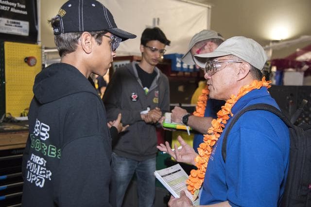 NASA image: NASA Systems Engineer Talks with Students at Robotics Competition