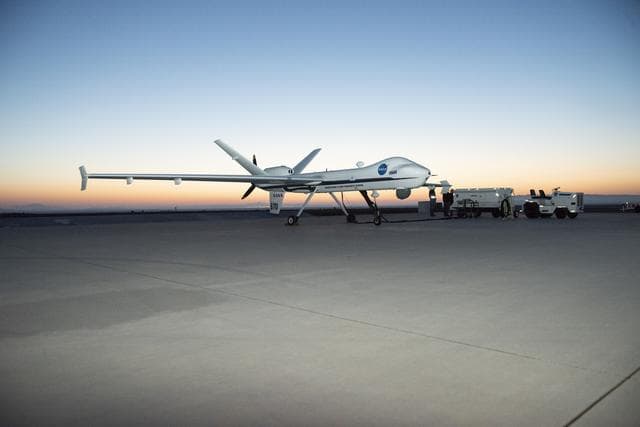 NASA image: Sun Rises over NASA’s Ikhana Aircraft as Armstrong Maintenance Crews Prepare the Aircraft for a Test Flight 