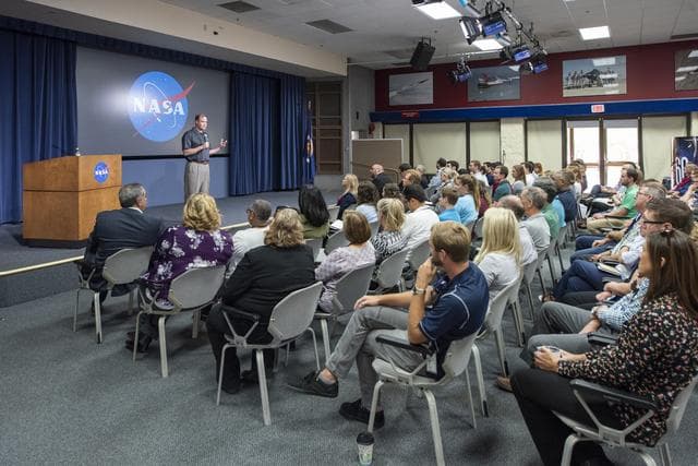 NASA image: Bridenstine holds town hall with employees speaking of his vision for the agency and answering questions. 