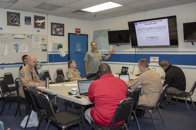 NASA image: NASA QSF18 Flight Crew Briefs Test Flight