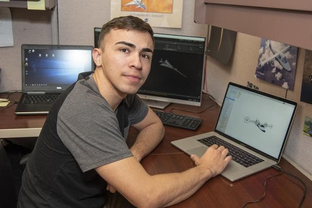 NASA image: Christopher Morales works on Aeronautics AR app