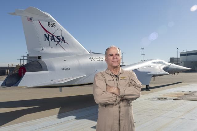 NASA image: Test Pilot Dan Canin Poses with X-59 Research Aircraft