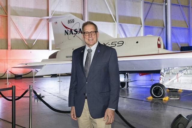 NASA image: Mission Manager Peter Coen Poses in Front of Unveiled X-59