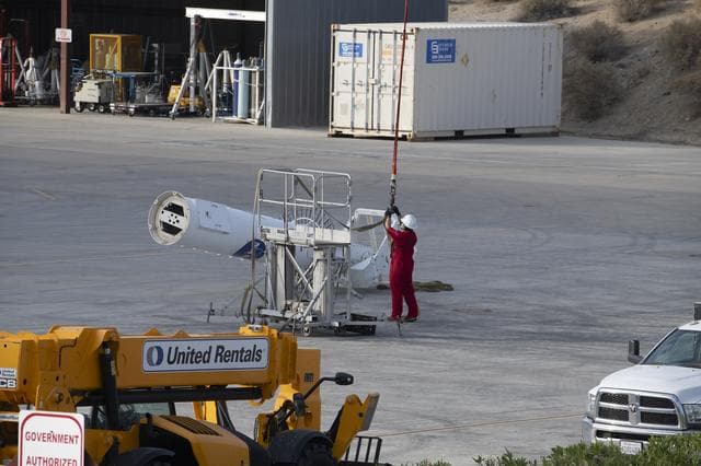 NASA image: Helicopter Removes Historic Rooftop Pedestal
