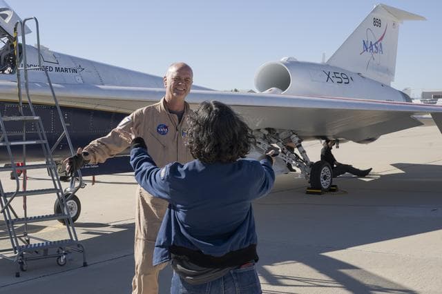 NASA image: NASA’s X-59 Test Pilot Hugs Wife After Historic First Flight