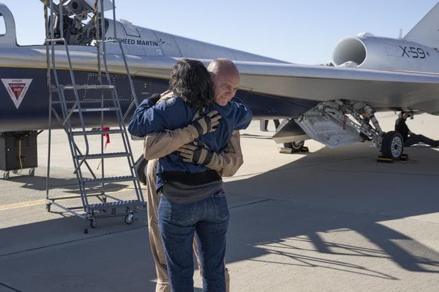 NASA image: NASA’s X-59 Test Pilot Hugs Wife After Historic First Flight