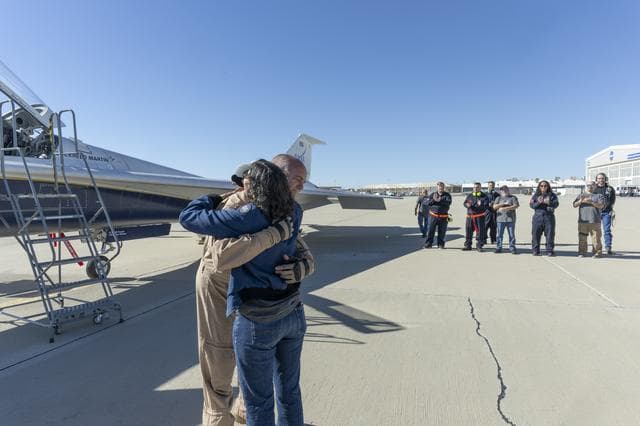 NASA image: NASA’s X-59 Test Pilot Hugs Wife After Historic First Flight