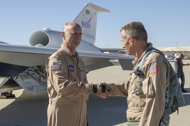 NASA image: NASA X-59 Chase Pilot Congratulates Aircraft Pilot After Historic First Flight