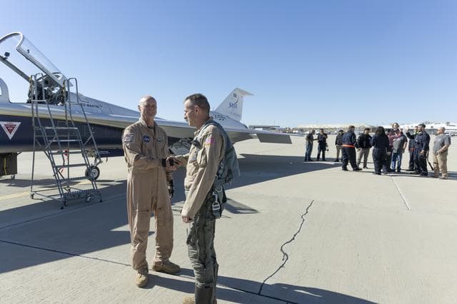 NASA image: NASA X-59 Chase Pilot Congratulates Aircraft Pilot After Historic First Flight
