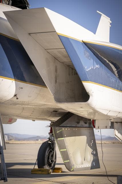 NASA image: NASA Wing Model Mounted Under F-15 for High-Speed Taxi Test