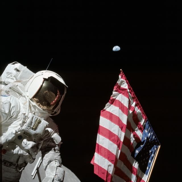 NASA image: Astronaut Harrison Schmitt next to deployed U.S. flag on lunar surface