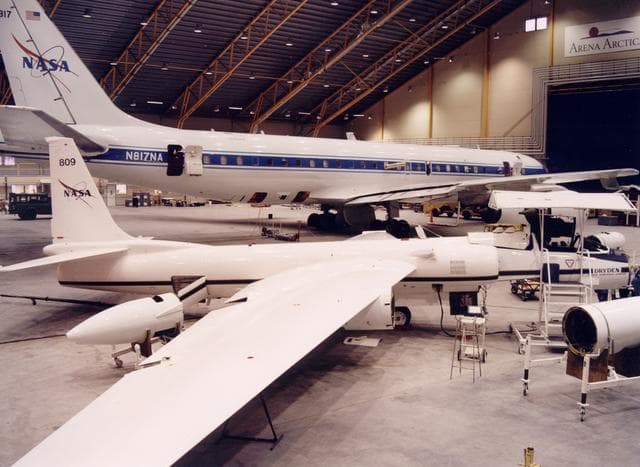 ER-2 #809 and DC-8 in Arena Arctica hangar in Kiruna, Sweden prior to the SAGE III Ozone Loss and Validation Experiment (SOLVE) 