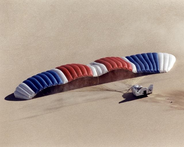 NASA image: The world's largest parafoil slowly deflates after carrying the X-38, V-131R, to a safe landing