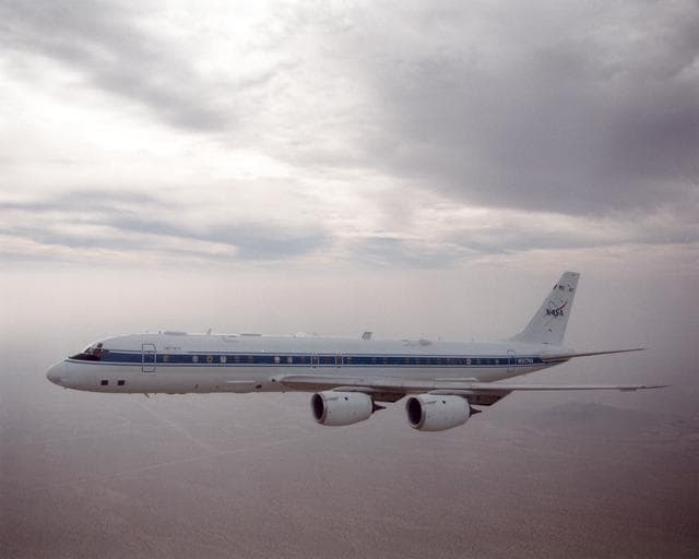 NASA image: DC-8 returning from AFWEX deployment showing AeroSAPIENT Ku-band antennas