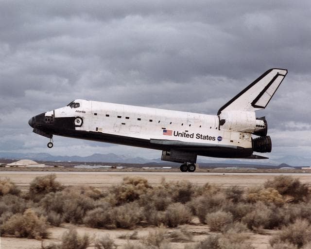 NASA image: Space Shuttle Atlantis landing at 12:33 p.m. February 20, 2001, on the runway at Edwards Air Force Base, California, where NASA's Dryden Flight Research Center is located