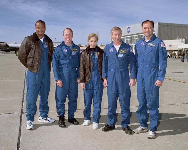NASA image: Crew of STS-98, L to R: Mission Specialists Robert L. Curbeam, Thomas D. Jones, and Marsha S. Ivins, Commander Kenneth D. Cockrell, and Pilot Mark L. Polansky
