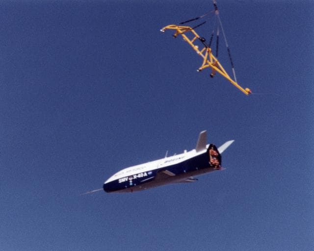NASA image: The X-40A immediately after release from its harness suspended from a helicopter 15,000 feet above NASA's Dryden Flight Research Center at Edwards Air Force Base, California, on March 14, 2001