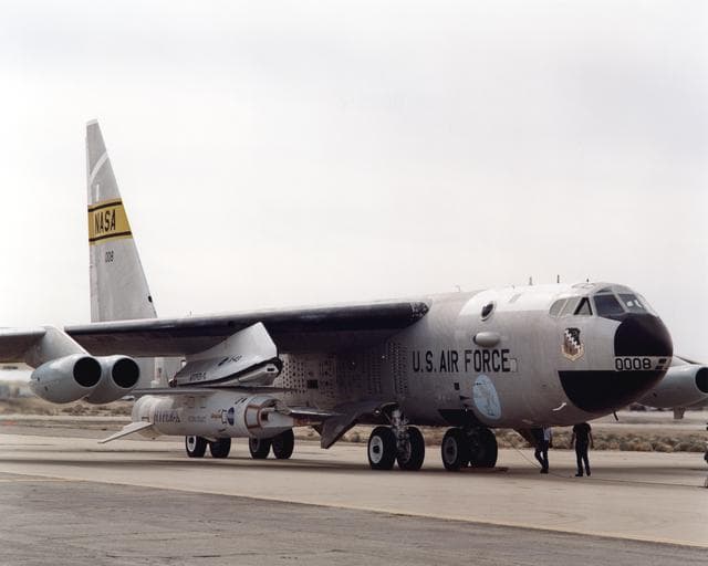 NASA image: The X-43A hypersonic research aircraft and its modified Pegasus® booster rocket nestled under the wing of NASA's NB-52B carrier aircraft during pre-flight systems testing