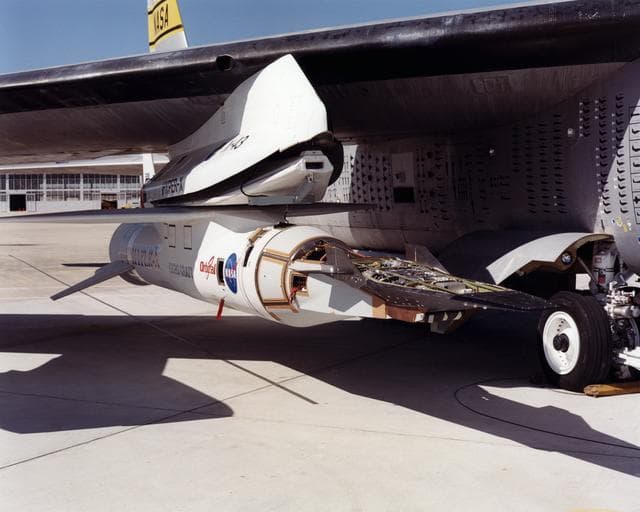 NASA image: The X-43A hypersonic research aircraft and its modified Pegasus® booster rocket mounted to NASA's NB-52B carrier aircraft at the Dryden Flight Research Center, Edwards, California