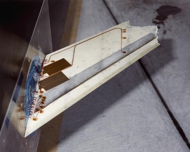 NASA image: The Aerostructures Test Wing (ATW), which consisted of an 18-inch carbon fiber test wing with surface-mounted piezoelectric strain actuators, following intentional failure on its final flight