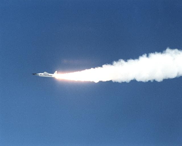 NASA image: Ignition of the Pegasus rocket moments after release from the B-52 signaled acceleration of the X-43A/Pegasus combination over the Pacific Ocean