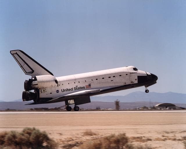 NASA image: Space Shuttle Endeavour touches down on the runway at Edwards Air Force Base, California to conclude International Space Station construction and supply mission STS-111