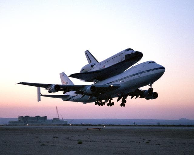NASA image: The Space Shuttle Endeavour, mounted securely atop one of NASA's modified Boeing 747 Shuttle Carrier Aircraft, left NASA's Dryden Flight Research Center at Edwards Air Force Base in Southern California at sunrise on Friday, June 28