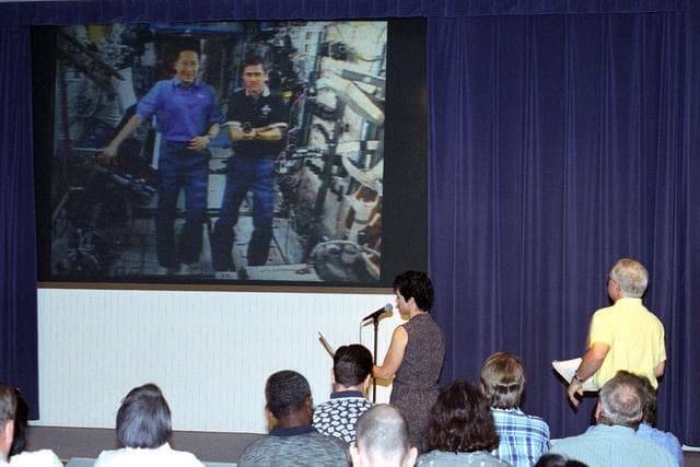 NASA image: Teacher Kim Cantrell from the Edwards Air Force Base Middle School, Edwards, Calif., participating in a live uplink at NASA Dryden as part of NASA's Explorer Schools program, asks the crew of the International Space Station a question