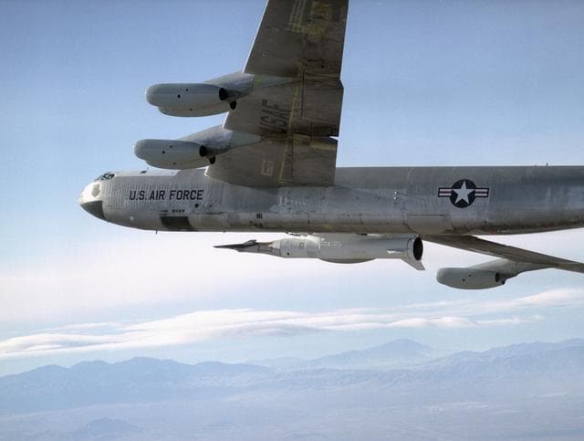 NASA image: NASA's B-52 mother ship carries the X-43A and its booster rocket on a captive carry flight Jan. 26, 2004