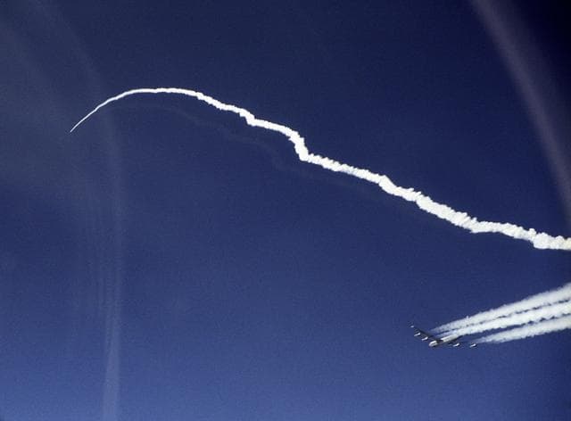 NASA image: he second X-43A and its modified Pegasus booster rocket accelerate after launch from NASA's B-52B launch aircraft over the Pacific Ocean
