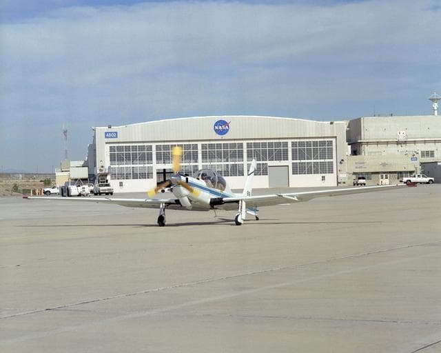 NASA's ultra-quiet YO-3A acoustics research aircraft taxis out from the ramp at the Dryden Flight Research Center before a pilot checkout flight
